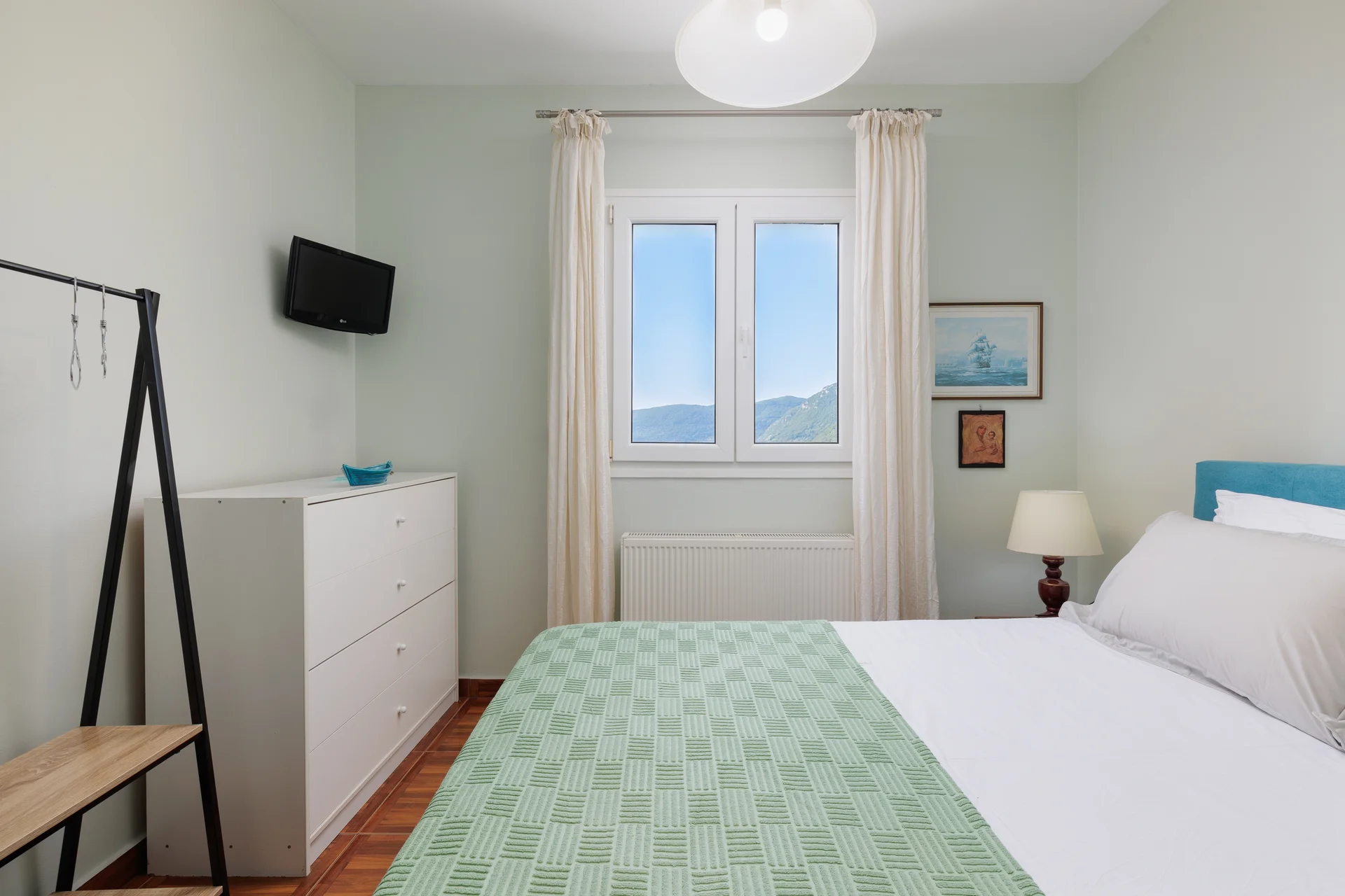 Bedroom details showing quality linens at Ef Zin Villa